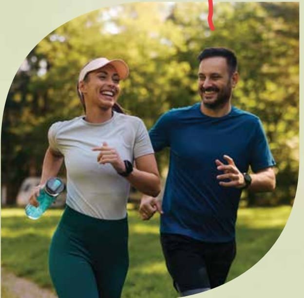 Couples jogging in the garden at Prestige Garden Trails Mira Road Dahisar